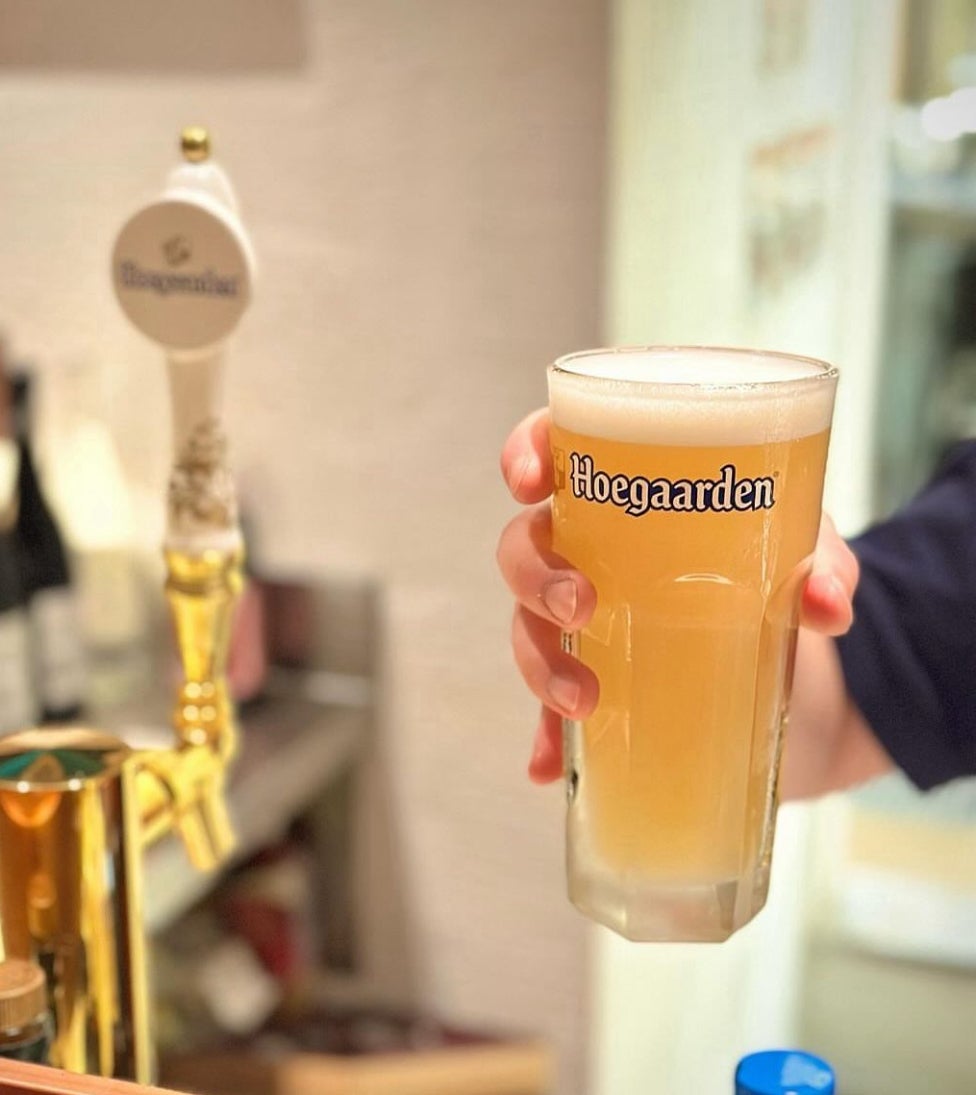 Cheers with ice-cold Hoegaarden White!