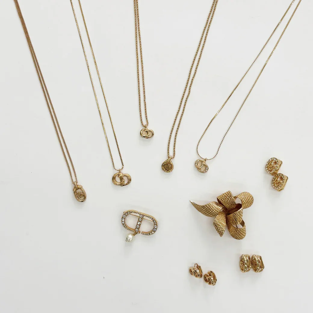 From left: NECKLACE: 28,600 yen (tax included) / NECKLACE: 29,700 yen (tax included) / BROOCH: 48,400 yen (tax included) / NECKLACE: 29,700 yen (tax included) / NECKLACE: 28,600 yen (tax included) / NECKLACE: 29,700 yen (tax included) / EARRRINGS: 29,700 yen (tax included) / BROOCH: 26,400 yen (tax included) / EARRRINGS: 29,700 yen (tax included) / EARRRINGS: 29,700 yen (tax included) All Christian Dior